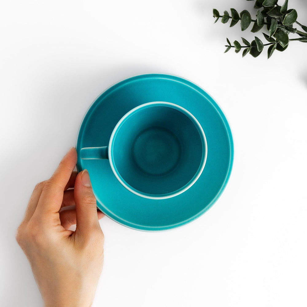 Turkish blue tea cup and saucer set with a smooth matte finish, offering a modern, vibrant touch to your tea rituals with its sleek and minimalist design.