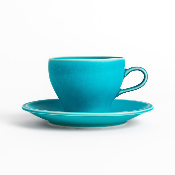 Turkish blue tea cup and saucer set with a smooth matte finish, offering a modern, vibrant touch to your tea rituals with its sleek and minimalist design.