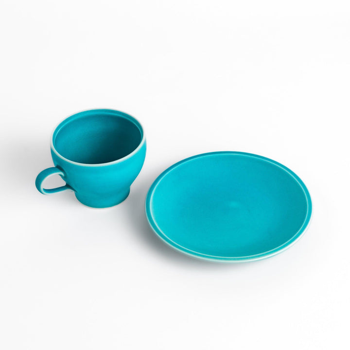 Turkish blue tea cup and saucer set with a smooth matte finish, offering a modern, vibrant touch to your tea rituals with its sleek and minimalist design.