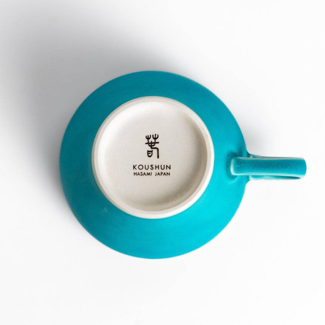 Vibrant Turkish blue tea cup with a smooth matte finish, featuring a contemporary design and a unique, elegant shape for your tea rituals.