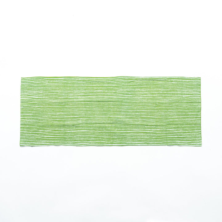 Green hand towel with vertical white stripes, laid flat for full view.