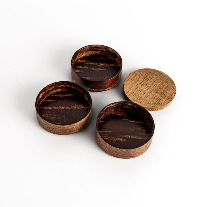 Exquisite jewelry case crafted from walnut and cherry bark, featuring a unique wavy design and a natural finish, perfect for storing precious treasures.