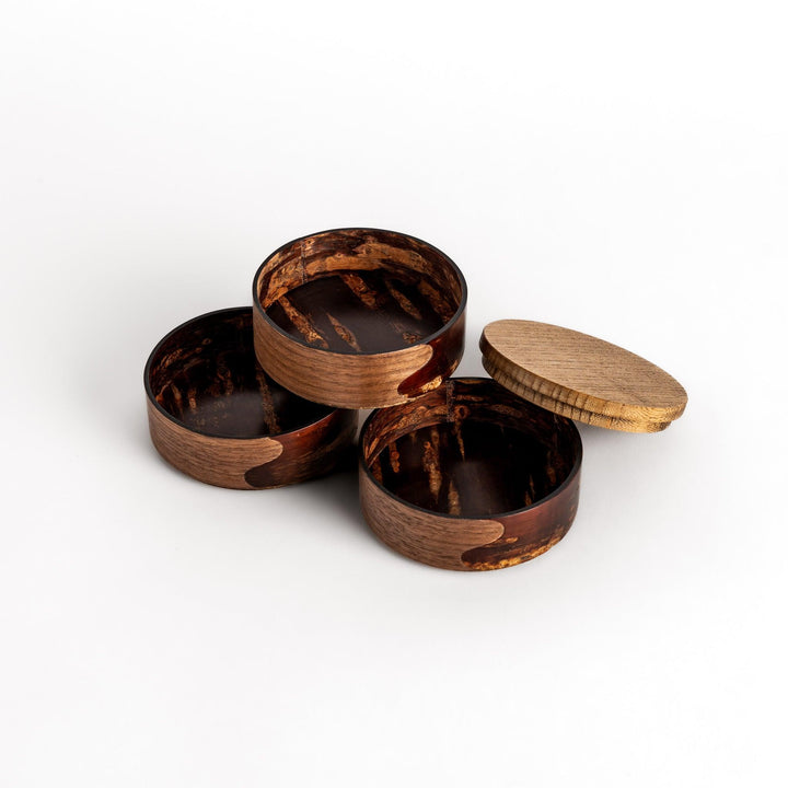 Exquisite jewelry case crafted from walnut and cherry bark, featuring a unique wavy design and a natural finish, perfect for storing precious treasures.