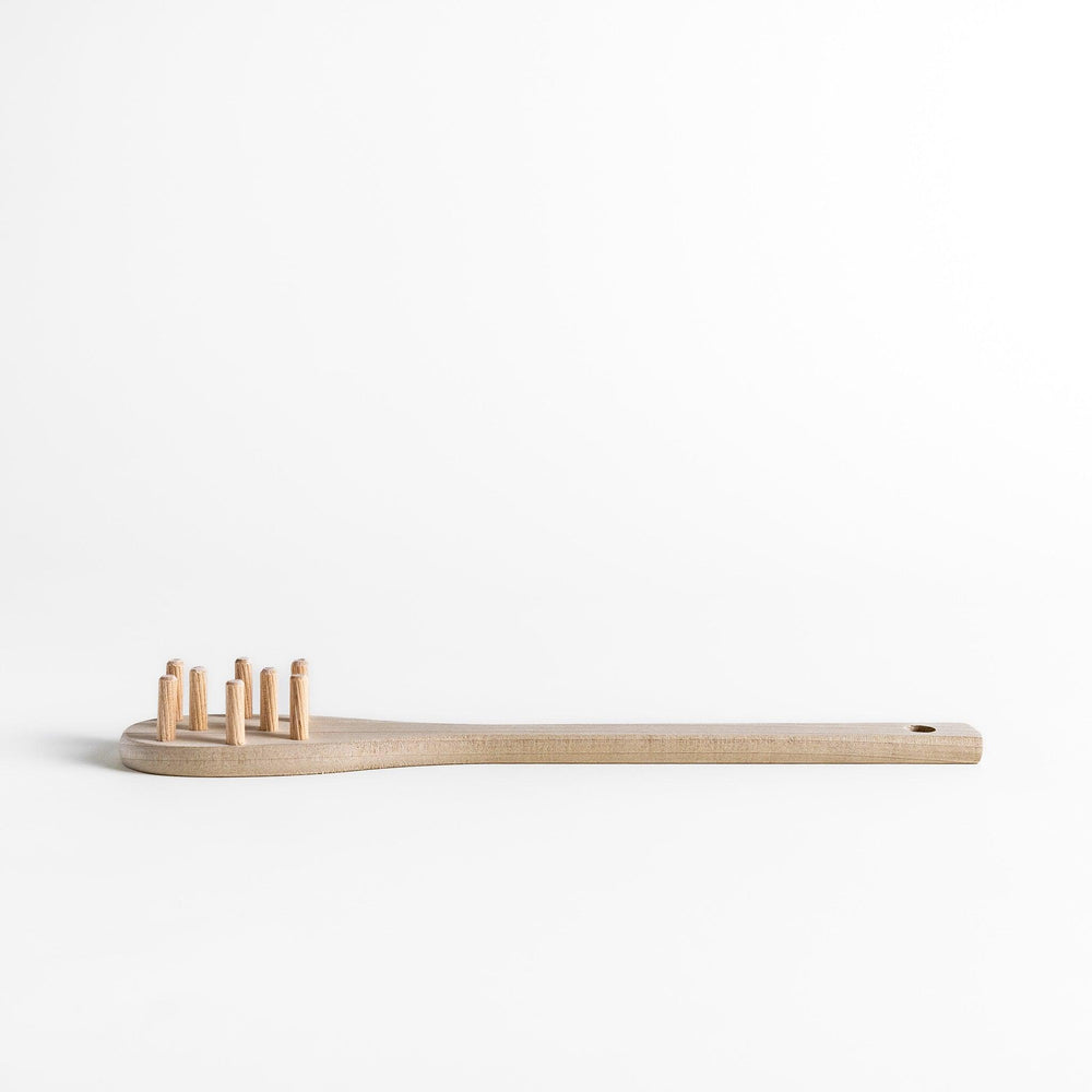 Wood Pasta Fork, a kitchenware tool with a wooden handle and forked design, ideal for stirring and serving pasta with ease while adding a natural touch to your kitchen.