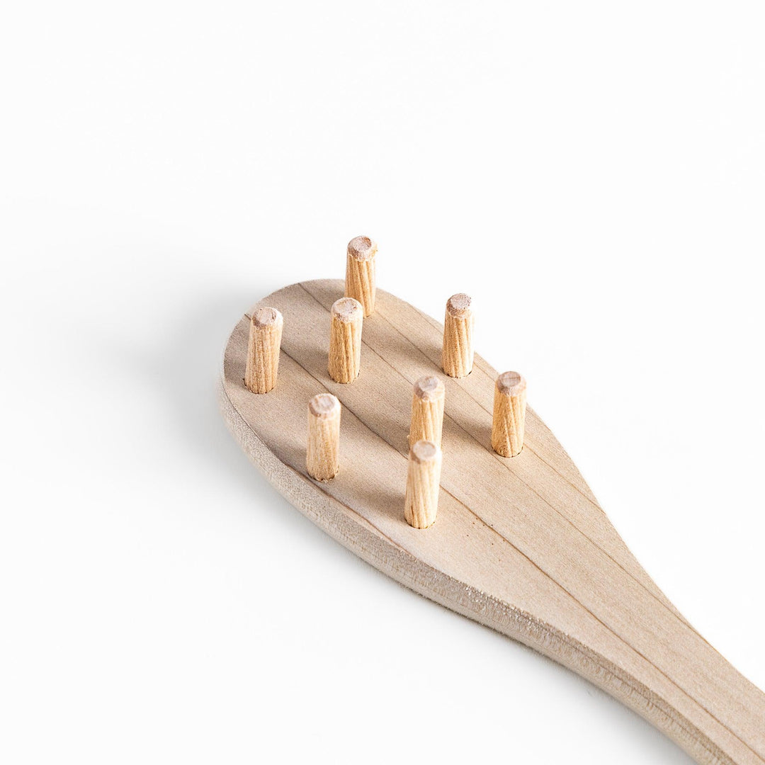 Wood Pasta Fork, a kitchenware tool with a wooden handle and forked design, ideal for stirring and serving pasta with ease while adding a natural touch to your kitchen.