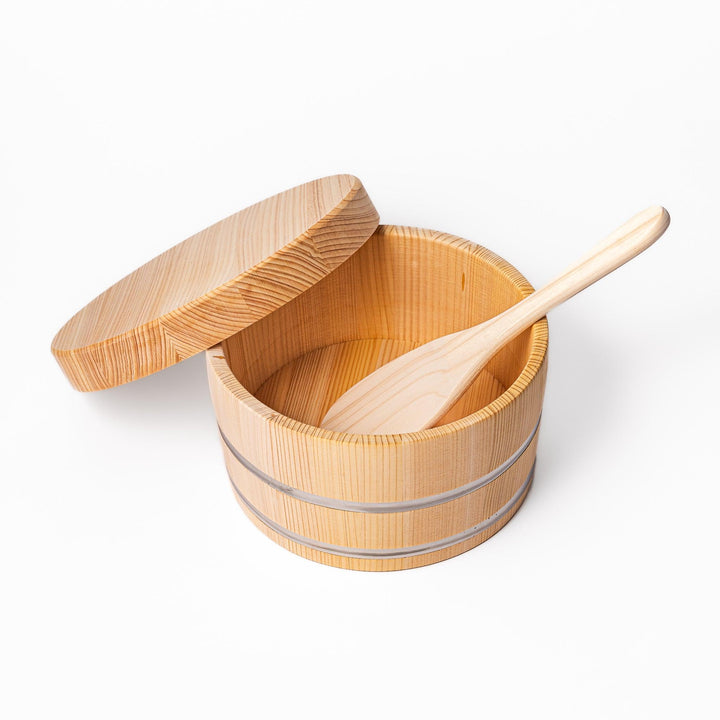 Wooden rice container with lid and paddle, made from natural wood with metal bands, ideal for storing and serving freshly cooked rice.