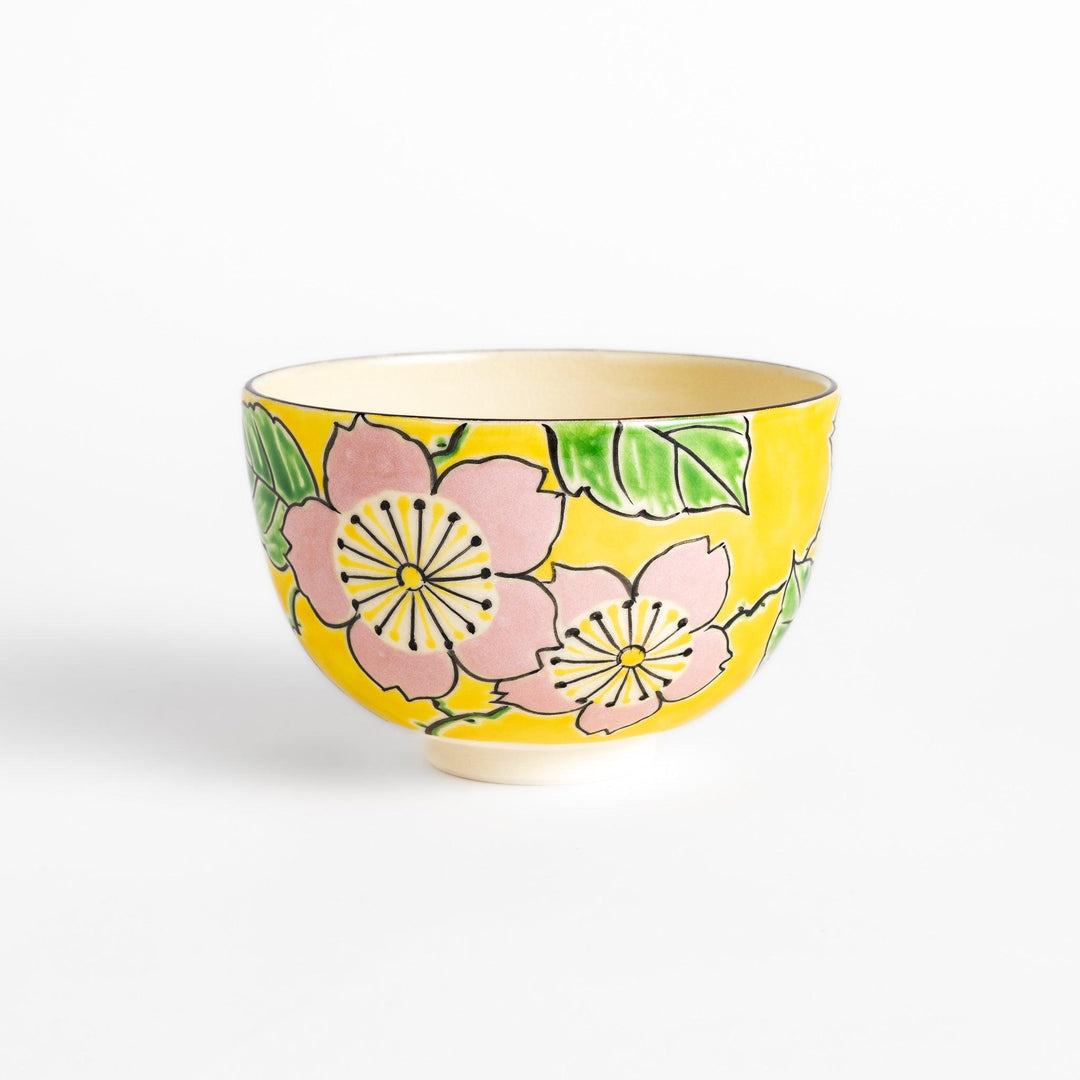 Vibrant yellow Matcha bowl, handcrafted ceramic with a unique, nature-inspired design perfect for enjoying traditional Japanese tea.