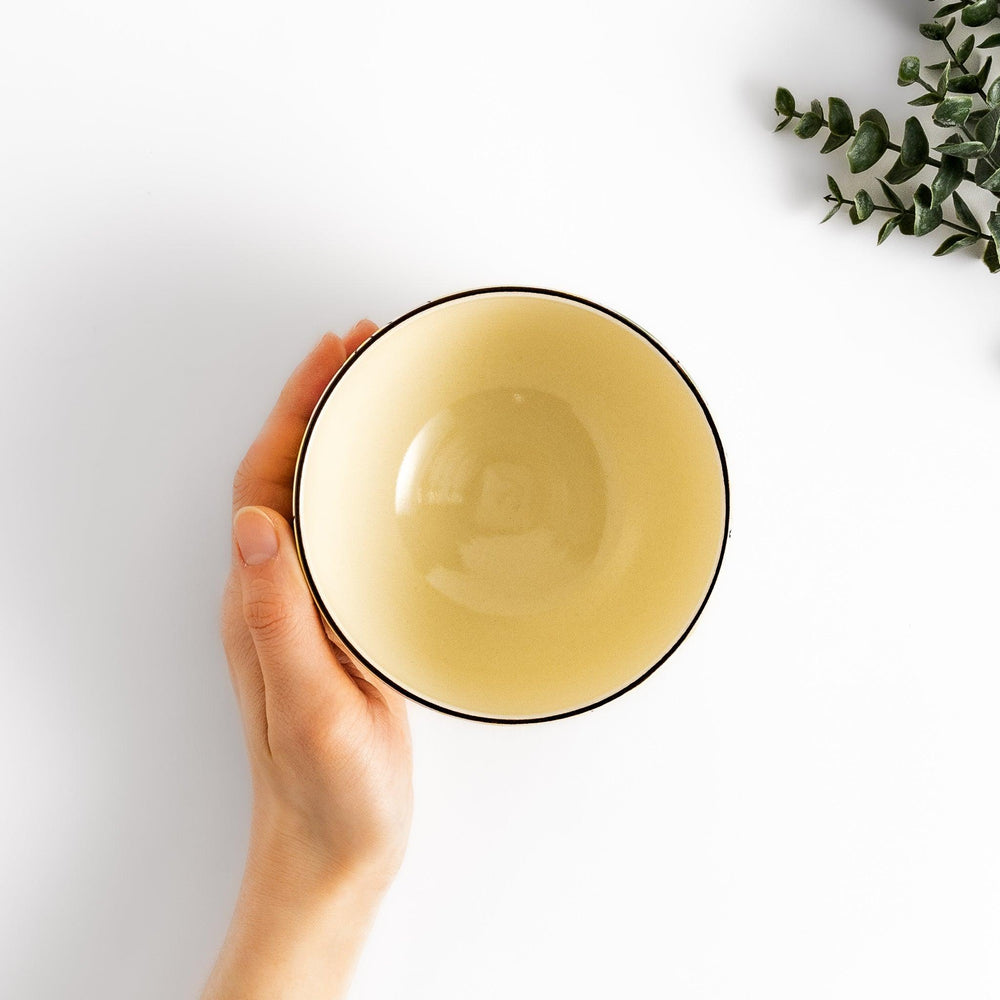 Vibrant yellow Matcha bowl, handcrafted ceramic with a unique, nature-inspired design perfect for enjoying traditional Japanese tea.