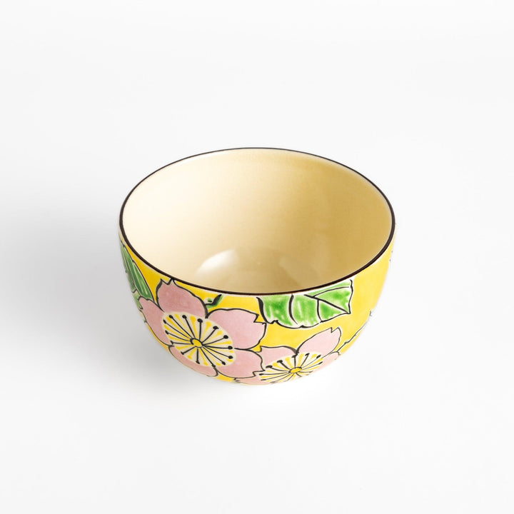 Vibrant yellow Matcha bowl, handcrafted ceramic with a unique, nature-inspired design perfect for enjoying traditional Japanese tea.