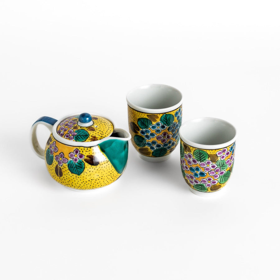 Vibrant yellow hydrangea tea set featuring a beautifully painted teapot and matching cups, perfect for adding a touch of elegance to your tea time.